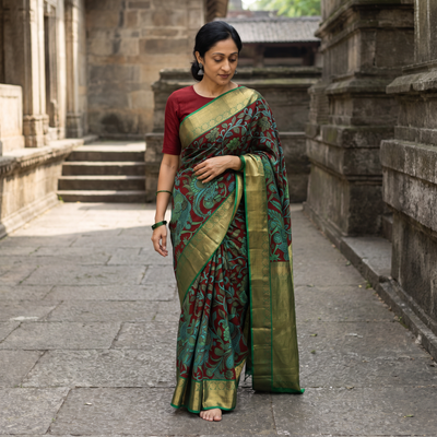 Green Kanjeevaram Pure Handloom Mulberry Silk Handpainted Srikalahasti Pen Kalamkari Saree with Zari Work, draped and worn by a woman, AI visual of the saree, iTokri