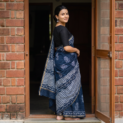 Blue Kashidakari Hand Embroidered Chanderi Silk Block Printed Handloom Saree with Zari Border, draped and worn by a woman, AI visual of the saree, iTokri