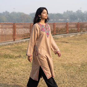 Brown Kashmiri Aari Hand Embroidered Handwoven Merino Wool Pheran, worn by a model, AI visual of the pheran, iTokri