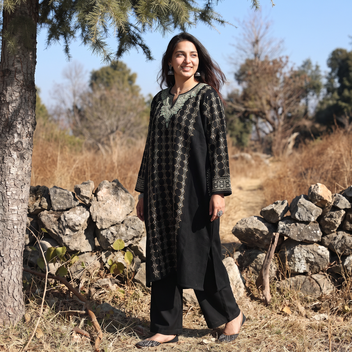 Black Kashmiri Heavy Sozni Hand Embroidered Handwoven Merino Wool Pheran, worn by a model, AI visual of the pheran, iTokri