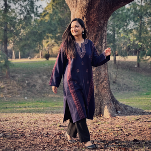 Blue Kashmiri Heavy Sozni Hand Embroidered Handwoven Merino Wool Pheran, worn by a model, AI visual of the pheran, iTokri