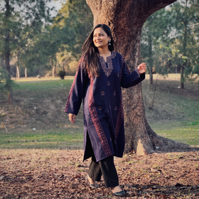 Blue Kashmiri Heavy Sozni Hand Embroidered Handwoven Merino Wool Pheran, worn by a model, AI visual of the pheran, iTokri