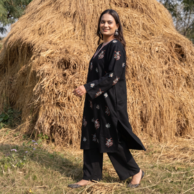 Black Kashmiri Heavy Sozni Hand Embroidered Handwoven Merino Wool Pheran, worn by a model, AI visual of the pheran, iTokri