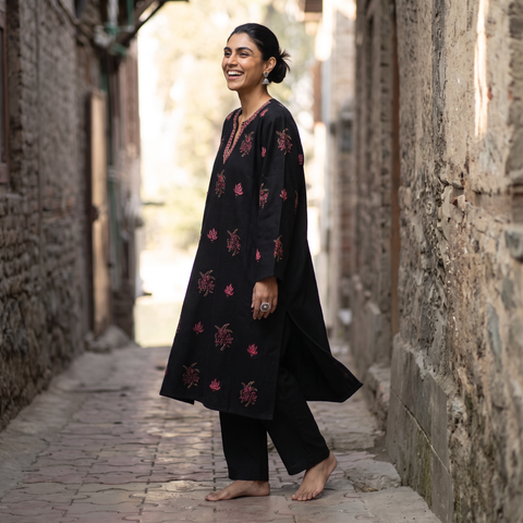 Black Kashmiri Heavy Sozni Hand Embroidered Handwoven Merino Wool Pheran, worn by a model, AI visual of the pheran, iTokri