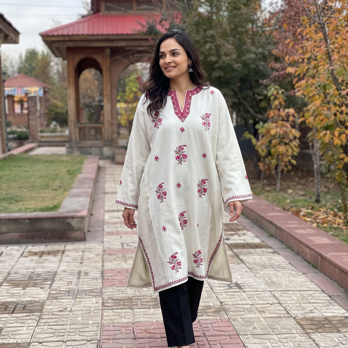 White Kashmiri Heavy Sozni Hand Embroidered Handwoven Merino Wool Pheran, worn by a model, AI visual of the pheran, iTokri