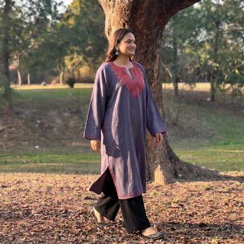 Blue Kashmiri Sozni Hand Embroidered Handwoven Merino Wool Pheran, worn by a model, AI visual of the pheran, iTokri