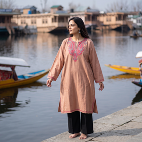 Brown Kashmiri Sozni Hand Embroidered Handwoven Merino Wool Pheran, worn by a model, AI visual of the pheran, iTokri