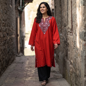 Red Kashmiri Sozni Hand Embroidered Handwoven Merino Wool Pheran, worn by a model, AI visual of the pheran, iTokri