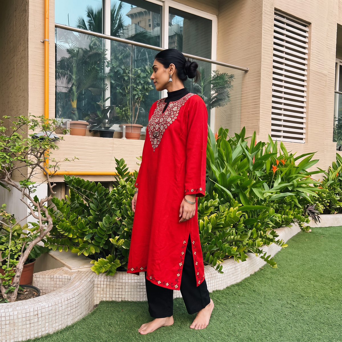 Red Kashmiri Sozni Hand Embroidered Handwoven Merino Wool Pheran, worn by a model, AI visual of the pheran, iTokri