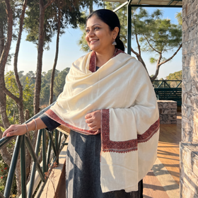 White Kashmiri Sozni Hand Embroidered Pure Handwoven Merino Wool Shawl, worn by a model, AI visual of the shawl, iTokri