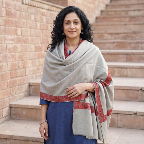 Grey Kashmiri Sozni Hand Embroidered Pure Handwoven Merino Wool Shawl, worn by a model, AI visual of the shawl, iTokri