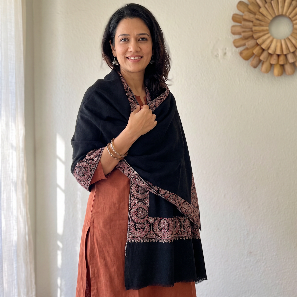 Black Kashmiri Sozni Heavy Hand Embroidered Pure Handwoven Merino Wool Shawl, worn by a model, AI visual of the shawl, iTokri