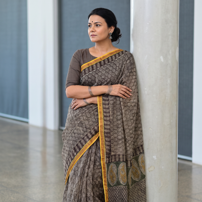 Grey Kota Doria Cotton Block Print Bagru Saree, draped and worn by a woman, AI visual of the saree, iTokri
