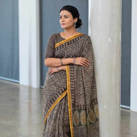 Grey Kota Doria Cotton Block Print Bagru Saree, draped and worn by a woman, AI visual of the saree, iTokri