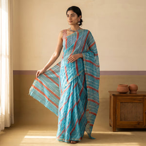 Turquoise Nazaakat Kota Doria Cotton Plain Saree with Blouse Piece & Earrings, draped and worn by a woman, AI visual of the saree, iTokri