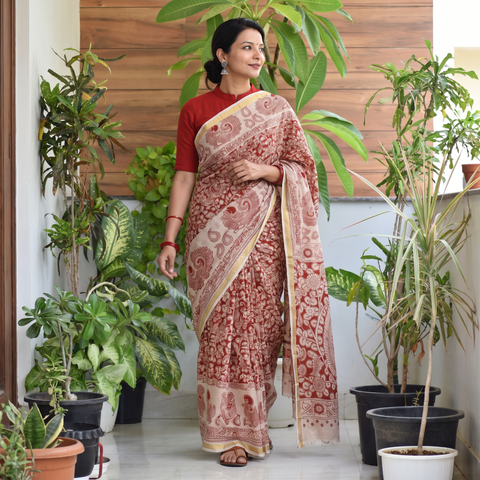 Red Kota Doria Cotton Printed Kalamkari Saree, draped and worn by a woman, AI visual of the saree, iTokri