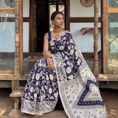 Purple Kota Doria Cotton Saree in Kalamkari Print, draped and worn by a woman, AI visual of the saree, iTokri