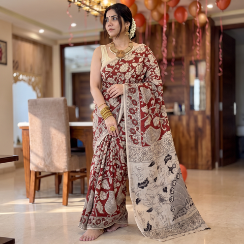 Red Kota Doria Cotton Saree in Kalamkari Print, draped and worn by a woman, AI visual of the saree, iTokri