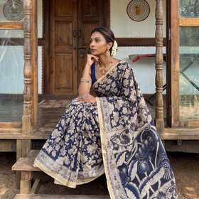 Black Kota Doria Cotton Saree in Kalamkari Print, draped and worn by a woman, AI visual of the saree, iTokri
