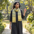 Yellow Kumaun Handwoven Merino Wool Stole, worn by a woman, AI visual of the stole, iTokri