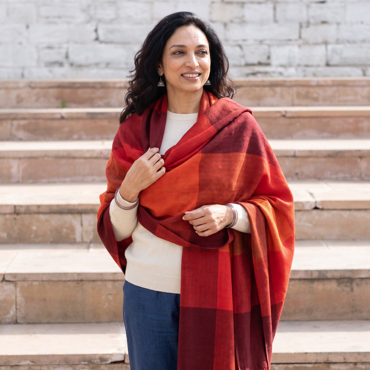 Orange Kumaun Handwoven Pure Merino Wool Shawl, worn by a model, AI visual of the shawl, iTokri