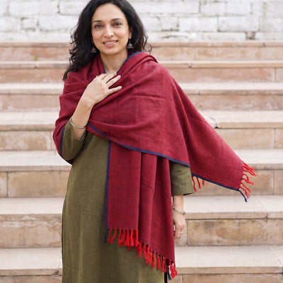 Red Kumaun Handwoven Pure Merino Wool Shawl, worn by a model, AI visual of the shawl, iTokri