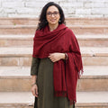 Red Kumaun Handwoven Pure Merino Wool Shawl, worn by a model, AI visual of the shawl, iTokri
