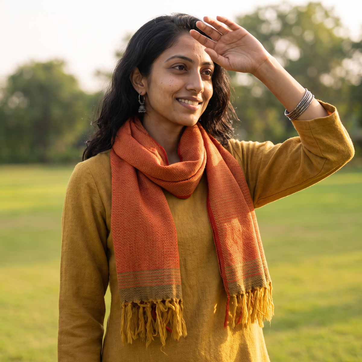 Orange Kumaun Handwoven Pure Merino Wool Stole, worn by a woman, AI visual of the stole, iTokri