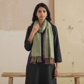 Green Kumaun Handwoven Pure Merino Wool Stole, worn by a woman, AI visual of the stole, iTokri