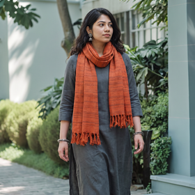 Orange Kumaun Handwoven Pure Merino Wool Stole, worn by a woman, AI visual of the stole, iTokri