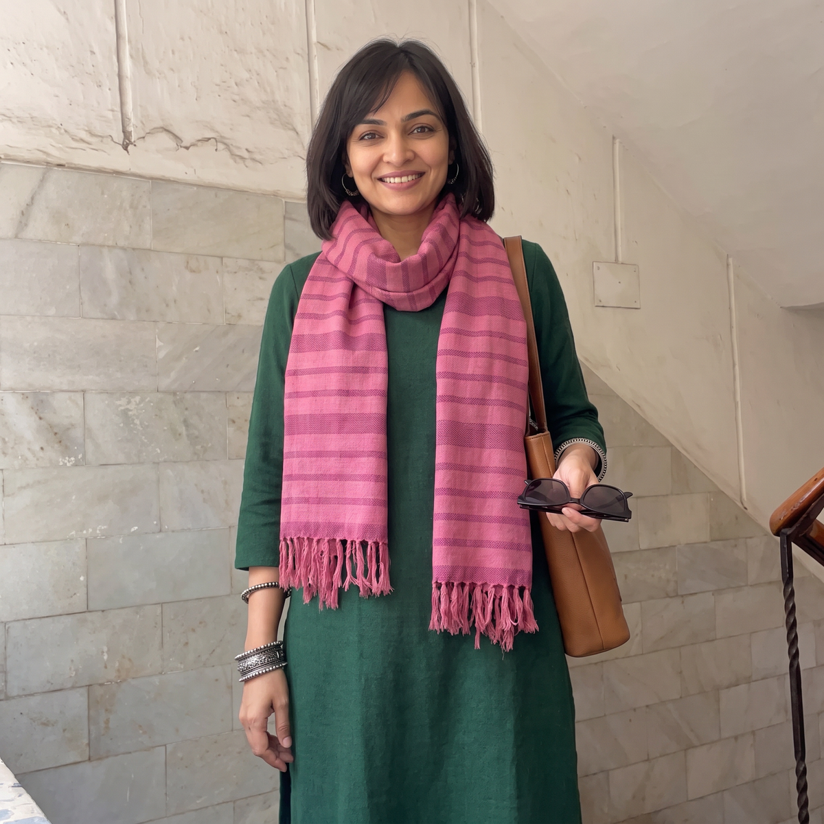 Pink Kumaun Handwoven Pure Merino Wool Stole, worn by a woman, AI visual of the stole, iTokri