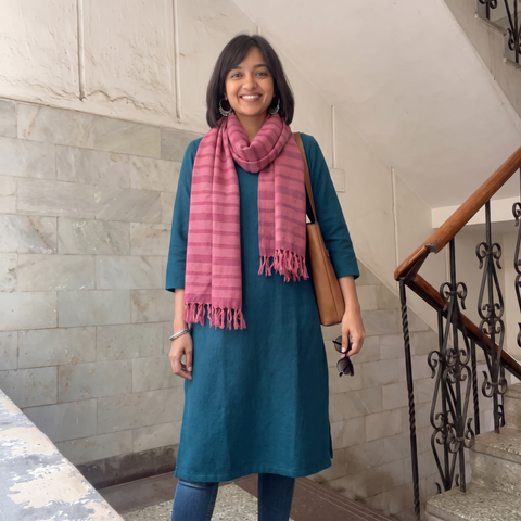 Pink Kumaun Handwoven Pure Merino Wool Stole, worn by a woman, AI visual of the stole, iTokri