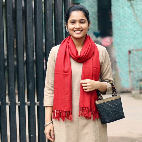Red Kumaun Handwoven Pure Merino Wool Stole, worn by a woman, AI visual of the stole, iTokri