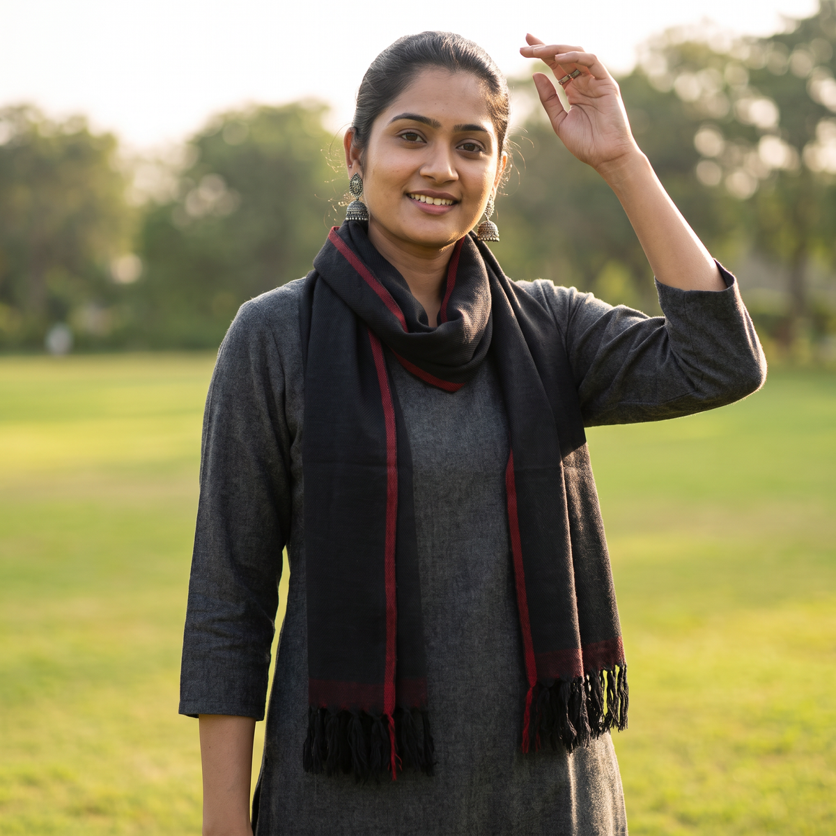 Black Kumaun Handwoven Pure Merino Wool Stole, worn by a woman, AI visual of the stole, iTokri
