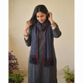 Black Kumaun Handwoven Pure Merino Wool Stole, worn by a woman, AI visual of the stole, iTokri