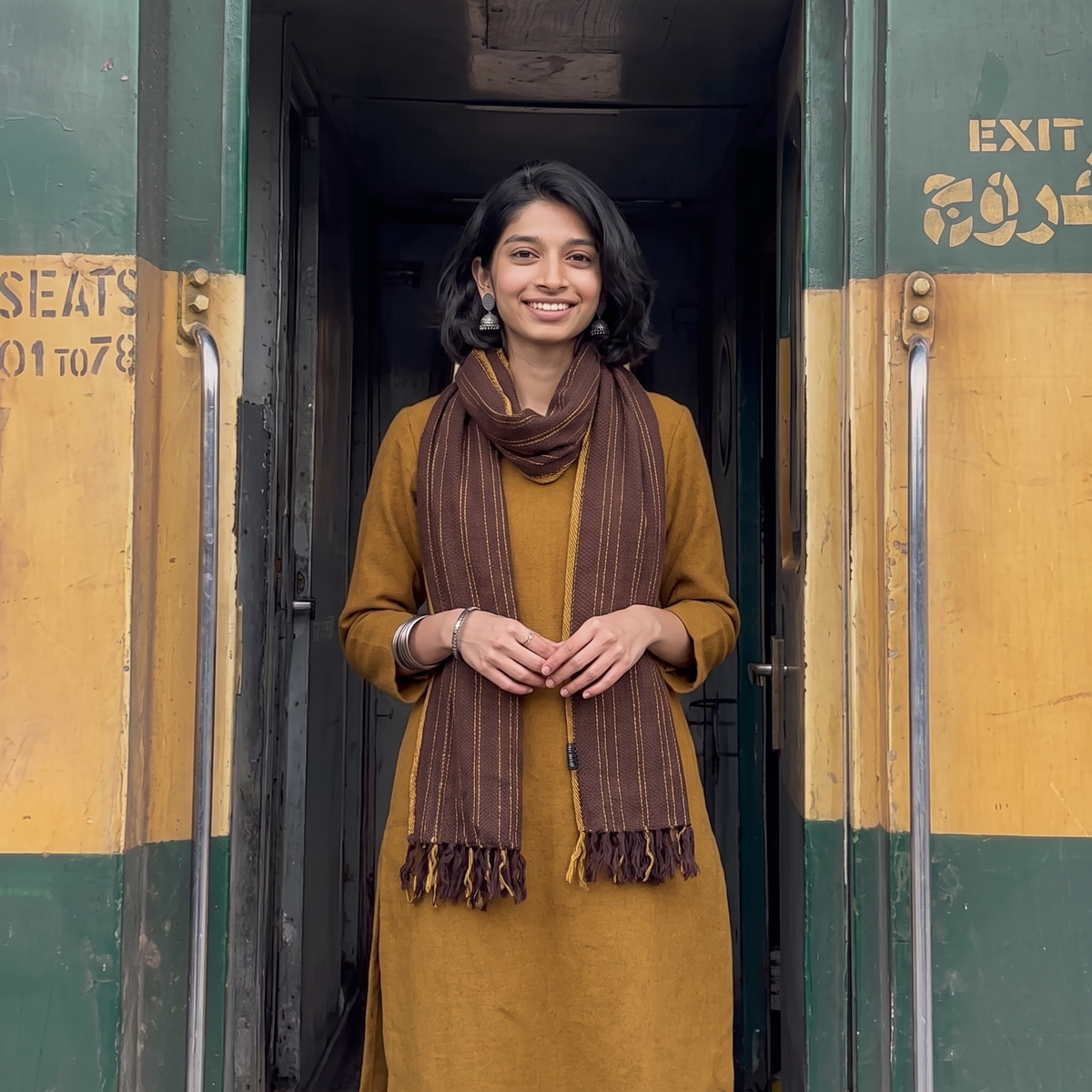 Brown Kumaun Handwoven Pure Merino Wool Stole, worn by a woman, AI visual of the stole, iTokri