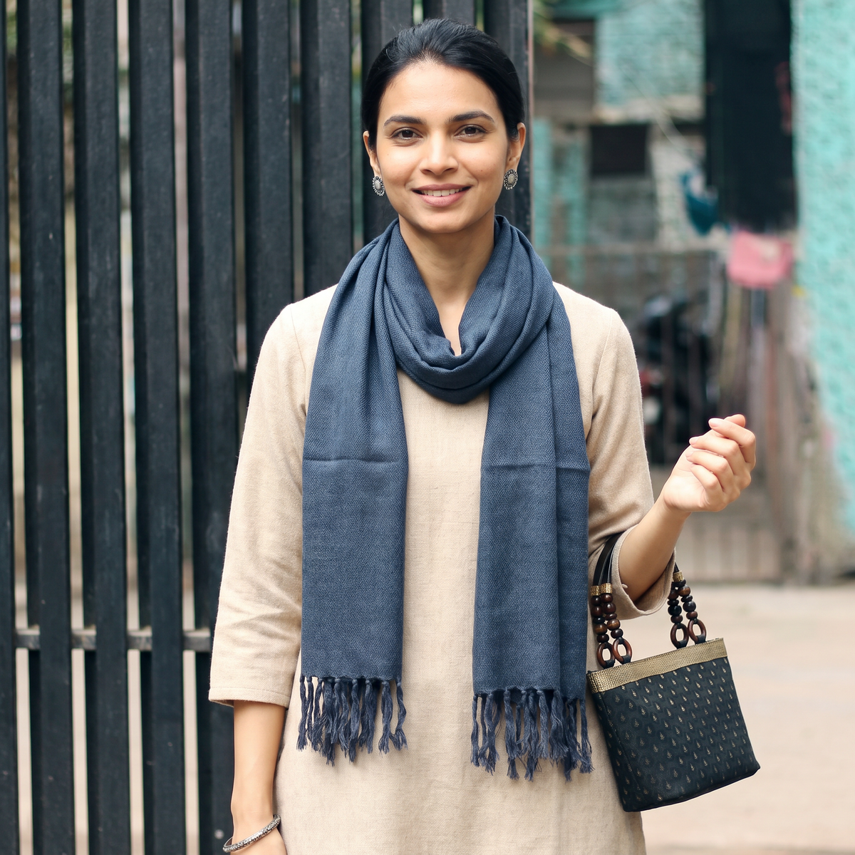 Blue Kumaun Handwoven Pure Merino Wool Stole, worn by a woman, AI visual of the stole, iTokri