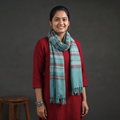 Green Kumaun Handwoven Pure Merino Wool Stole, worn by a woman, AI visual of the stole, iTokri