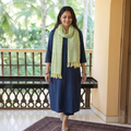 Green Kumaun Handwoven Pure Merino Wool Stole, worn by a woman, AI visual of the stole, iTokri