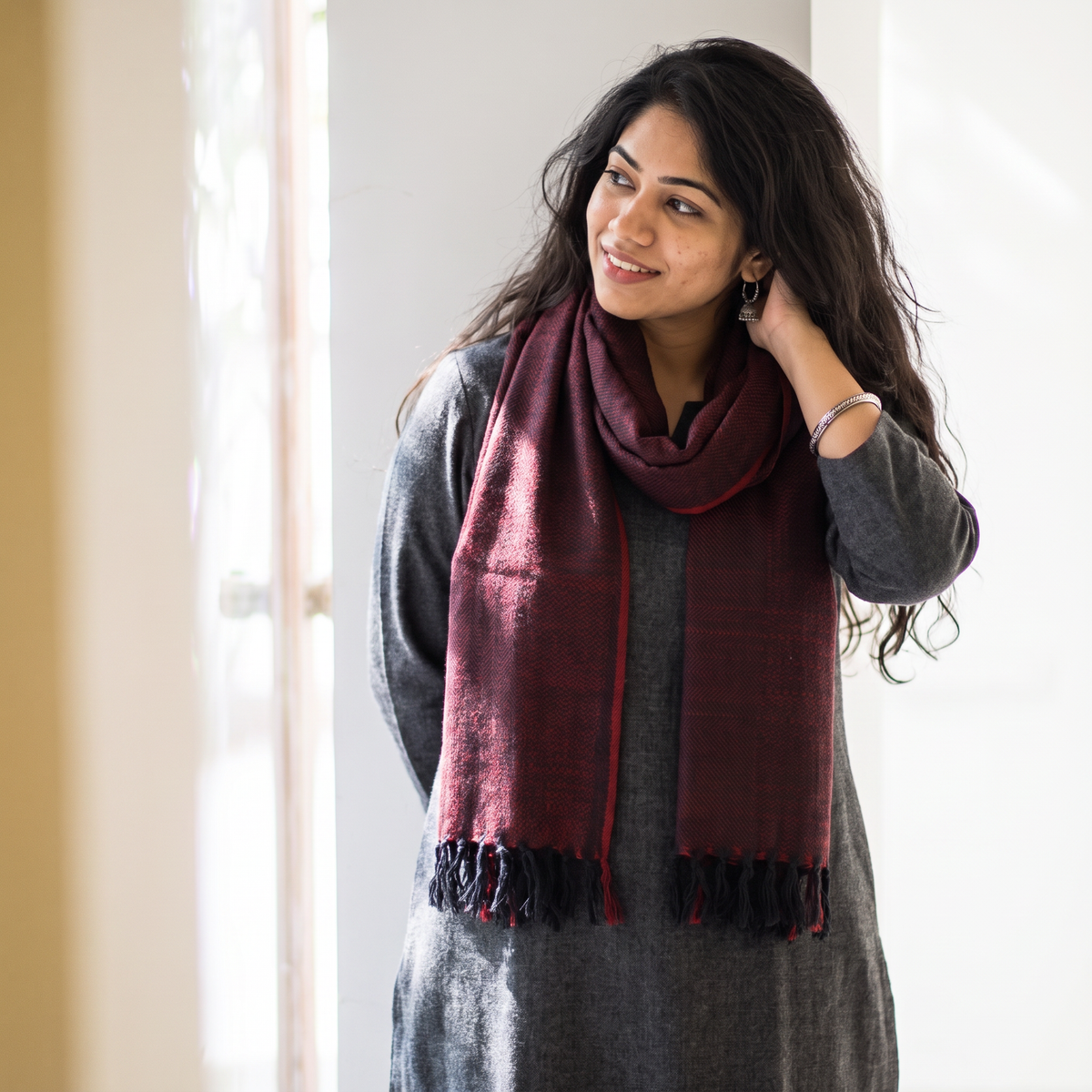 Maroon Kumaun Handwoven Pure Merino Wool Stole, worn by a woman, AI visual of the stole, iTokri