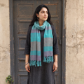 Green Kumaun Handwoven Pure Merino Wool Stole, worn by a woman, AI visual of the stole, iTokri