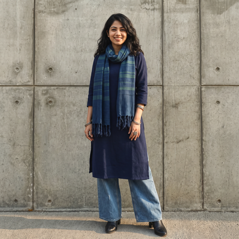 Blue Kumaun Handwoven Pure Merino Wool Stole, worn by a woman, AI visual of the stole, iTokri