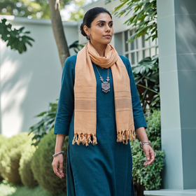 Beige Kumaun Handwoven Pure Merino Wool Stole, worn by a woman, AI visual of the stole, iTokri