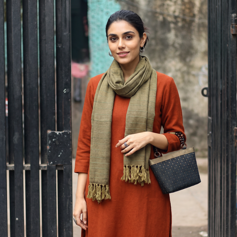Green Kumaun Handwoven Pure Merino Wool Stole, worn by a woman, AI visual of the stole, iTokri
