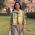 Yellow Kumaun Handwoven Pure Merino Wool Stole, worn by a woman, AI visual of the stole, iTokri