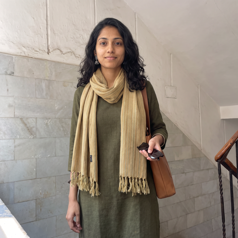 Green Kumaun Handwoven Pure Merino Wool Stole, worn by a woman, AI visual of the stole, iTokri