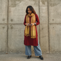 Yellow Kumaun Handwoven Pure Merino Wool Stole, worn by a woman, AI visual of the stole, iTokri