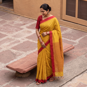 Yellow Kuppadam Pure Handspun Handloom Cotton Saree, draped and worn by a woman, AI visual of the saree, iTokri