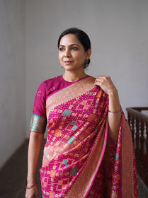 Pink Kutch Bandhani Fine Georgette Banarasi Neem Zari Jaal Saree, draped and worn by a woman, AI visual of the saree, iTokri