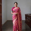 Pink Kutch Bandhani Fine Georgette Banarasi Neem Zari Jaal Saree, draped and worn by a woman, AI visual of the saree, iTokri